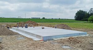 Przekrój płyty fundamentowej: Odkryj kluczowe elementy i ich funkcje w budowie domu